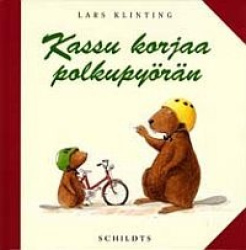 Kassu korjaa polkupyörän