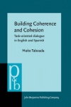 Building Coherence and Cohesion - Task - Oriented Dialogue in English and Spanish