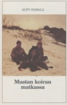 MUSTAN KOIRAN MATKASSA